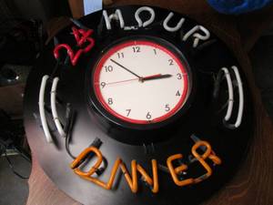 lot 54 image: 24 hour diner neon sign...