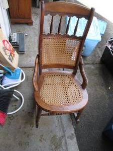 lot 57 image: Ornate wicker rocking chair...