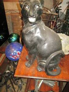 lot 63 image: Glass cat with cracked leg 21 tall...