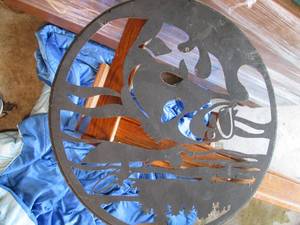 lot 73 image: Thick metal wall hanging two feet a...