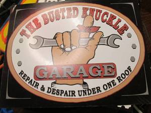 lot 78 image: Metal Busted knuckle garage sign...