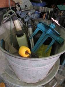 lot 95 image: Metal bucket filled with sprinklers...