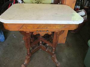 lot 117 image: Granite top table with ornate wood ...