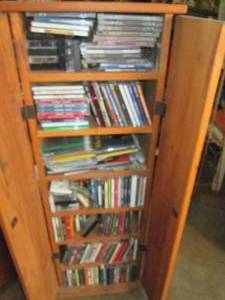 lot 121 image: Wood holder filled with CDs ....man...