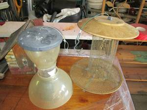 lot 143 image: Three bird feeders...