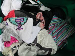 lot 291 image: Tote of ladies clothes and shoes...