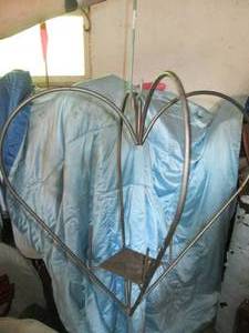 lot 152 image: Metal heart shaped planter holder...