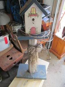 lot 165 image: Wood bird house 40 tall...