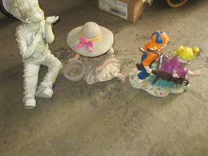 lot 256 image: 4 poly resin garden figures...