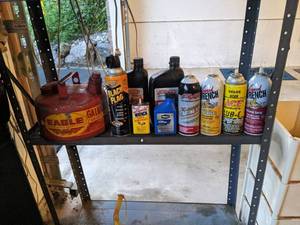 lot 207 image: Car Essentials- Motor Oil, Galvanized Steel Gas Can, & More