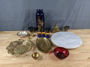 lot 133 image: Assortment of Ornate Serving Dishes Silverplated Ikora Germany Dish, Mussbach Metall German Platter, Winterling Bavaria Germany Dish, Blue KHM Bavaria Bowl, Krisna Napkin Holder, Red Royal Ruby Anchorglass Bowl, Stone Lazy Susan and More Z