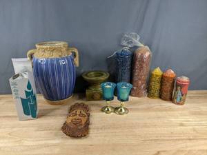 lot 134 image: Collection of 6 New, Unburned Pillar Candles (1 by Partylite Gifts), Set of Teal Tea Lights with Stands, Wooden Candle Pedestal, Ornate Wooden Mask and Tall Ceramic Pot Z