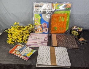 lot 190 image: Crafters Delight (2) Scrapbooks, Fiskars Scrapbook Shapecutting Set, Felt Message Board, Assorted Fabric Transfers, Patches, and More  X