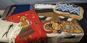 lot 184 image: Assortment of Hot Pads, 2 Sets of Placemats, Large Blue Blanket and 27 x 58 Wall Hanger X