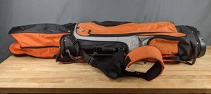 lot 178 image: Orange Golf Bag with Gold Clubs Hybrid Iron 3 & 4, 6 7 8 Iron and More Q