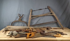 lot 179 image: Assortment of Wood Handle Handsaws, Pickaxe Tool and More Q