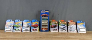 lot 233 image: An Assortment of Hot Wheels and Matchbox Cars New in Boxes Q