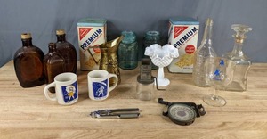 lot 216 image: Vintage Collectible Items 1776 Log Cabin Amber Glass Syrup Container, Nabisco Premium Cracker Tins, Morton Salt Girl Coffee Mugs, Fenton Milk Glass Pedastal Bowl and More Q