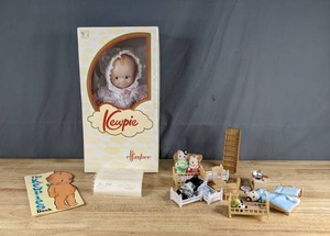 lot 281 image: 2001 Kewpie Doll with COA, The Kewpies Book, Calico Critters Play Set X