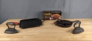 lot 269 image: Nordic Ware Brique Ware Loaf Pan and (2) Cast Iron Irons, Lodge Cast Iron Grill Pan and Wedge Pan X