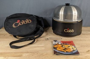lot 251 image: Portable Cobb Grill with Cobb Carry Bag and Cooking the Cobb Way by Shirley Guy X