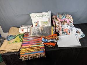 lot 295 image: Assortment of Linens Placemats, Curtains, Sleeping Bag, White Sheet, Pillowcase, Burlap Sack, and More  X