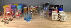 lot 335 image: Assortment of Collectible Drinking Glasses and More Bugs Bunny, Yosemite Sam, Daffy Duck, Wimpy, Vintage Christmas Santa, Fantasia Mickey and More W