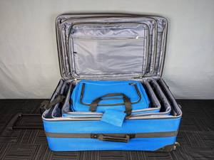 lot 339 image: Blue 4-Piece Luggage Set W