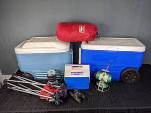 lot 338 image: For the Outdoorsman Coleman and Igloo Coolers, Flood Lights, Marlboro Sleeping Bag, Binoculars and More W