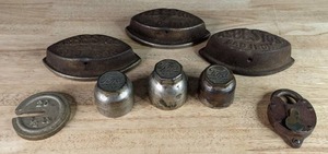 lot 30 image: Vintage Asbestos Sad Iron Door Stops, Model T Ford Threaded Chrome Hub Caps, and B & M RR Boston and Maine Railroad Lock W