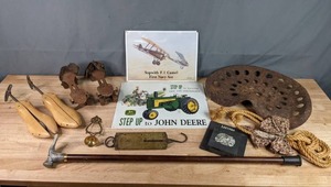 lot 412 image: Vintage Wooden Shoe Stretchers, Vintage Roller Skates, Tractor Seat, John Deere Sign, Cane, & More W