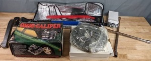 lot 413 image: Car Equipment Ohio Caliper, Firestone Brake Drum or Rotor, & More W