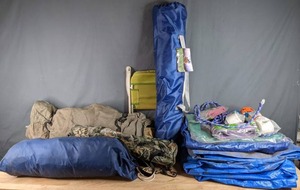 lot 414 image: Camping Equipment Tarps, Tent, Outdoor Adventure Ultimate Tailgate Stand Cooler, Re Web Kit, Camping Chairs, & More W