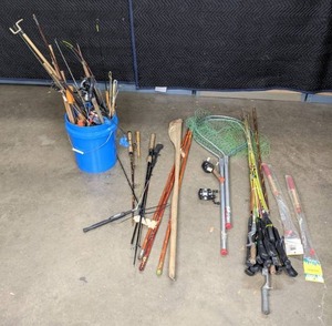 lot 433 image: Fishing Supplies Jig Rods, Nets, Reels and More W