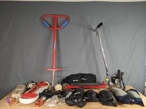 lot 409 image: Assortment of Sports Equipment & More EA Sports Big XSS Hoverboard, Golf Balls, Bass Pro Shop Xbox Fishing Rod, Stinger Scooter, Jumparoo Boing Pogo Stick, & More W