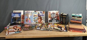lot 386 image: A Collection of Various Magazines, Wrestling DVD Board Game, Wrestling Magazines, Books, The Polar Express Movie, The Illustrated Childrens Bible, Carpentry Essentials Book and More   W