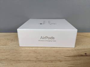 lot 11A image: Brand New Apple AirPods with Wireless Charging Case Y