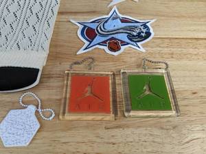 lot 39A image: Florida Panthers Beach Balls, NHL All Star Patches, Cavs NBA Flag, FSU, Jordan & Lebron Keychains Y