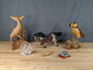 lot 37 image: Set of 2 Wooden Dolphin, Horse, Toucan and Painted Turtle Figurines and Clear Stone with Toucan Design  P