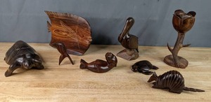 lot 34 image: Collection of Seven (7) Carved Wooden Figures Turtles, Pelican, Armadillo, Rose, Fish, Otter, and Other  P