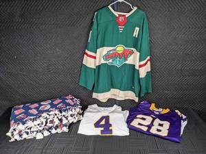 lot 77 image: Minnesota Twins Blanket, #4 Favre 2XL Jersey, #11 Parise Minnesota Wild Hockey Jersey Size US 56, #28 Peterson Minnesota Vikings 2XL Jersey   W