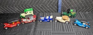 lot 78 image: A Collection of 7 Vintage Toy Cars   W