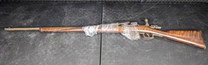 lot 26 image: Antique 52-Inch Bolt Action Rifle Q