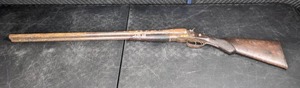 lot 27 image: Antique 48-Inch Double Barrel Shotgun Q