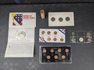 lot 24 image: 1980 Liberty Dollar Coins, 1982 Zinc & Copper Peenies, 1982 Uncirculated Mint Coins, Roll of Indian Head Pennies, 5$ Heroes of Desert Storm Coins and 1982 Lincoln Cents Q