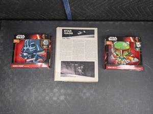 lot 70 image: 1977 Star Wars Poster, Star Wars Boba Fett Light Up Wall Sticker and Star Wars Darth Vader Light Up Wall Sticker   Q