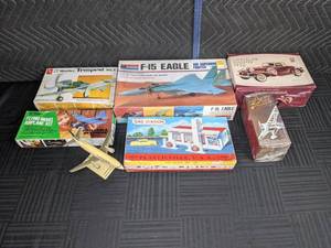 lot 74 image: A Collection of Model Planes, Chrystler Roadster, Jet and Gas Station  Q