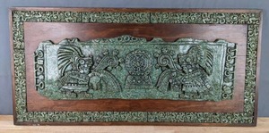 lot 83 image: Mayan Style Artwork Carved Stone LookWood Wall Plaque  P