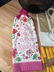 lot 104A image: Miscellaneous Kitchen Items - Mugs, Corn Cob Holders, Plastic Tablecloths, Serving Spoons, Wood Lazy Susan, Black & Decker Electric Knife, and more D