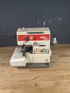 lot 492 image: Elna Lock Sewing Machine  R
